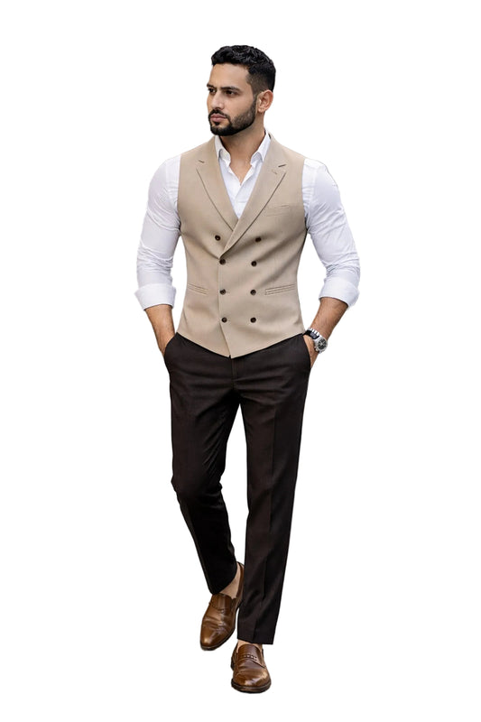 Man in a beige vest and brown pants.