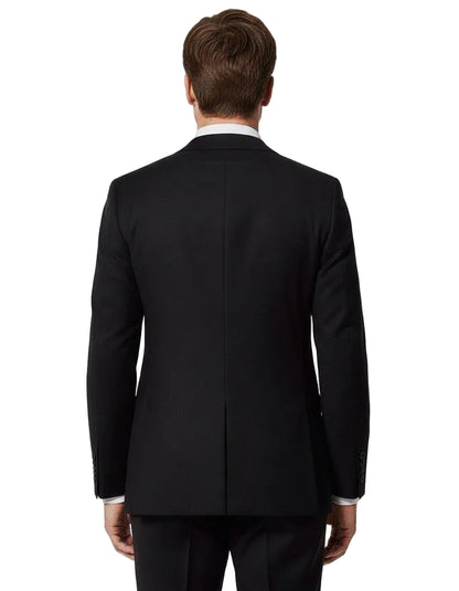 Black suit jacket worn by a person on a white background